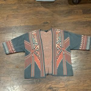 Kimono style open cardigan in excellent condition.  Perfect for layering